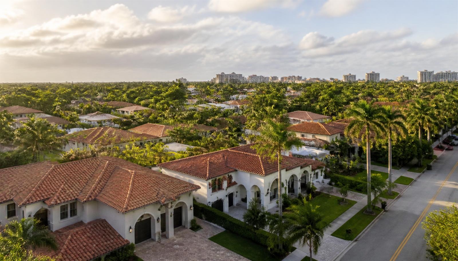 Aerial view of a South Florida neighborhood of tile-roof homes protected by homeowners insurance